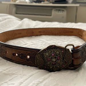 Rhinestone buckle leather belt. Cowboy style 27” belt. Almost new.